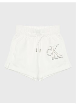 Calvin Klein Jeans Szorty sportowe Reveal Monogram IG0IG01981 Biały Regular Fit ze sklepu MODIVO w kategorii Spodenki dziewczęce - zdjęcie 168548684