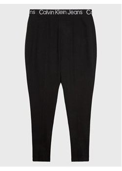 Calvin Klein Jeans Legginsy J20J220835 Czarny Slim Fit ze sklepu MODIVO w kategorii Spodnie damskie - zdjęcie 168551464