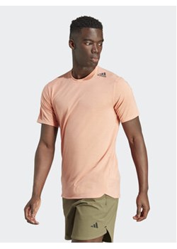 adidas Koszulka techniczna Designed for Training IL1443 Pomarańczowy Slim Fit ze sklepu MODIVO w kategorii T-shirty męskie - zdjęcie 168556383