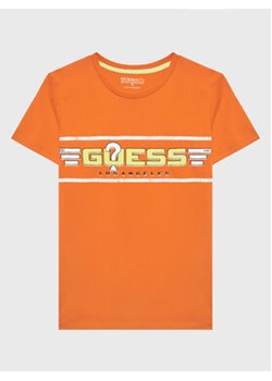 Guess T-Shirt L3RI17 K8HM0 Pomarańczowy Regular Fit ze sklepu MODIVO w kategorii T-shirty chłopięce - zdjęcie 168559944