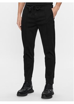 Boss Spodnie dresowe Hadiko Mirror 50505320 Czarny Regular Fit ze sklepu MODIVO w kategorii Spodnie męskie - zdjęcie 168560874