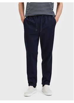 Selected Homme Spodnie materiałowe Selby 16085172 Granatowy Slim Fit ze sklepu MODIVO w kategorii Spodnie męskie - zdjęcie 168562551