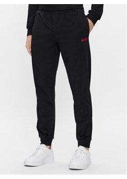 Hugo Spodnie dresowe Linked 50505151 Czarny Regular Fit ze sklepu MODIVO w kategorii Spodnie męskie - zdjęcie 168563984