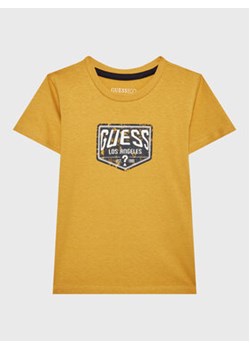 Guess T-Shirt N3GI09 K8HM0 Pomarańczowy Regular Fit ze sklepu MODIVO w kategorii T-shirty chłopięce - zdjęcie 168564574