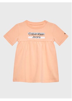 Calvin Klein Jeans Sukienka codzienna Hero Logo IN0IN00065 Pomarańczowy Regular Fit ze sklepu MODIVO w kategorii Sukienki niemowlęce - zdjęcie 168566931