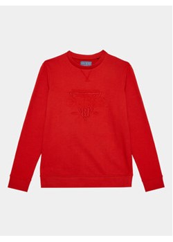 Guess Bluza L3BQ05 KAD74 Czerwony Regular Fit ze sklepu MODIVO w kategorii T-shirty chłopięce - zdjęcie 168567140