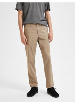 Selected Homme Spodnie materiałowe New 16087665 Beżowy Regular Fit ze sklepu MODIVO w kategorii Spodnie męskie - zdjęcie 168567804