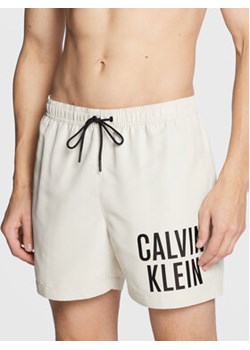 Calvin Klein Swimwear Szorty kąpielowe KM0KM00790 Écru Regular Fit ze sklepu MODIVO w kategorii Kąpielówki - zdjęcie 168568981