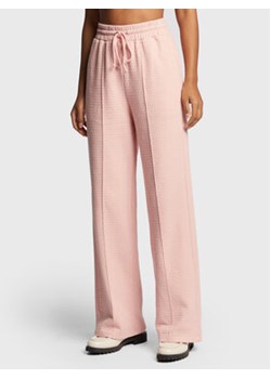 American Vintage Spodnie dresowe Ellan ELLA05AH22 Różowy Loose Fit ze sklepu MODIVO w kategorii Spodnie damskie - zdjęcie 168569301