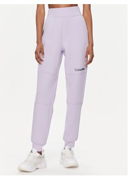 Calvin Klein Performance Spodnie dresowe 00GWF3P636 Fioletowy Relaxed Fit ze sklepu MODIVO w kategorii Spodnie damskie - zdjęcie 168569703