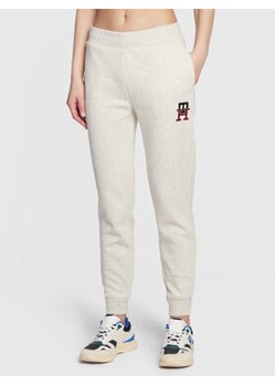 Tommy Hilfiger Spodnie dresowe Monogram Emb WW0WW37435 Szary Regular Fit ze sklepu MODIVO w kategorii Spodnie damskie - zdjęcie 168574063