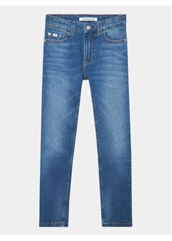 Calvin Klein Jeans Jeansy IB0IB01716 Niebieski Slim Fit ze sklepu MODIVO w kategorii Spodnie chłopięce - zdjęcie 168575521