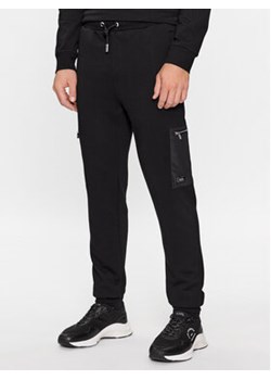 KARL LAGERFELD Spodnie dresowe 705041 534910 Czarny Regular Fit ze sklepu MODIVO w kategorii Spodnie męskie - zdjęcie 168577271