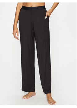 Calvin Klein Underwear Spodnie piżamowe 000QS7007E Czarny Relaxed Fit ze sklepu MODIVO w kategorii Piżamy damskie - zdjęcie 168579554