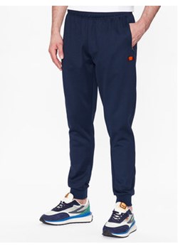 Ellesse Spodnie dresowe Bertoni SHR04351 Granatowy Regular Fit ze sklepu MODIVO w kategorii Spodnie męskie - zdjęcie 168581830
