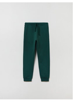 OVS Spodnie dresowe 1833882 Zielony Regular Fit ze sklepu MODIVO w kategorii Spodnie chłopięce - zdjęcie 168582041
