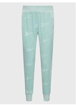 Reebok Spodnie dresowe Classics Energy Q4 HH9804 Niebieski Slim Fit ze sklepu MODIVO w kategorii Spodnie damskie - zdjęcie 168583821