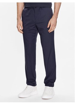 Boss Spodnie materiałowe T Drax 50482656 Granatowy Regular Fit ze sklepu MODIVO w kategorii Spodnie męskie - zdjęcie 168584573
