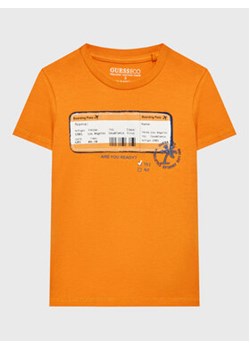 Guess T-Shirt N3GI06 K8HM0 Pomarańczowy Regular Fit ze sklepu MODIVO w kategorii T-shirty chłopięce - zdjęcie 168584870