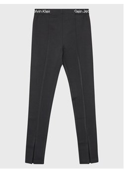 Calvin Klein Jeans Legginsy Logo Tape IG0IG01986 Czarny Slim Fit ze sklepu MODIVO w kategorii Spodnie dziewczęce - zdjęcie 168586611
