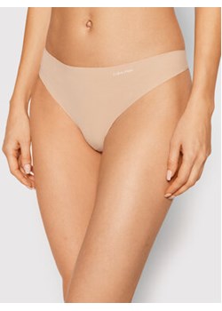 Calvin Klein Underwear Stringi 0000D3428E Beżowy ze sklepu MODIVO w kategorii Majtki damskie - zdjęcie 168587493
