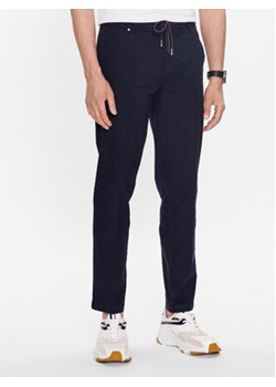 Boss Spodnie materiałowe 50487750 Niebieski Slim Fit ze sklepu MODIVO w kategorii Spodnie męskie - zdjęcie 168590380