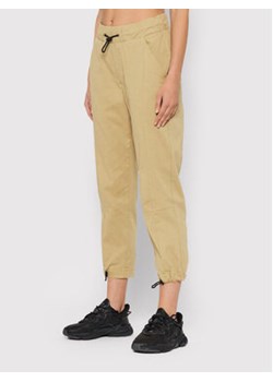 Outhorn Spodnie materiałowe SPDC601 Beżowy Relaxed Fit ze sklepu MODIVO w kategorii Spodnie damskie - zdjęcie 168591773