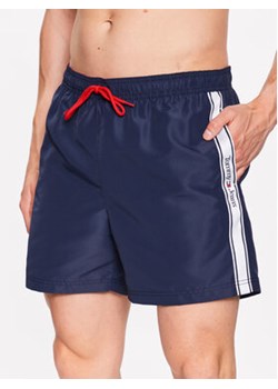 Tommy Jeans Szorty kąpielowe UM0UM02757 Granatowy Slim Fit ze sklepu MODIVO w kategorii Kąpielówki - zdjęcie 168592092