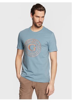 Guess T-Shirt Round Logo M3GI11 J1314 Niebieski Slim Fit ze sklepu MODIVO w kategorii T-shirty męskie - zdjęcie 168597152