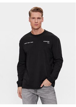Calvin Klein Jeans Longsleeve Spray J30J324642 Czarny Relaxed Fit ze sklepu MODIVO w kategorii T-shirty męskie - zdjęcie 168605763