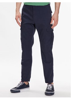 Tommy Jeans Spodnie materiałowe Ethan DM0DM15793 Granatowy Regular Fit ze sklepu MODIVO w kategorii Spodnie męskie - zdjęcie 168611101