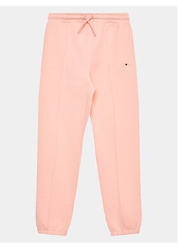 Tommy Hilfiger Spodnie dresowe KS0KS00494 D Różowy Regular Fit ze sklepu MODIVO w kategorii Spodnie dziewczęce - zdjęcie 168612480