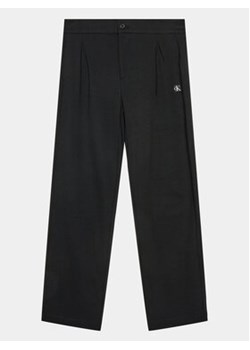 Calvin Klein Jeans Spodnie materiałowe Ceremony IB0IB01936 Czarny Regular Fit ze sklepu MODIVO w kategorii Spodnie chłopięce - zdjęcie 168617991