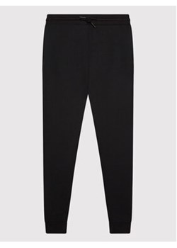 Calvin Klein Jeans Spodnie dresowe Shadow Logo IB0IB01010 Czarny Regular Fit ze sklepu MODIVO w kategorii Spodnie dziewczęce - zdjęcie 168618653