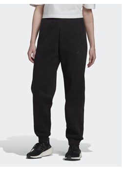adidas Spodnie dresowe All Szn HK0439 Czarny Relaxed Fit ze sklepu MODIVO w kategorii Spodnie damskie - zdjęcie 168618712
