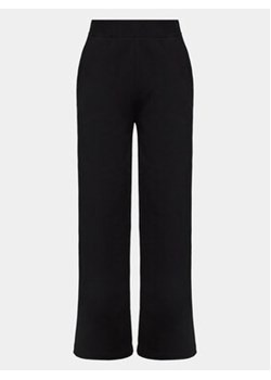 Outhorn Spodnie dresowe OTHAW23TTROF484 Czarny Regular Fit ze sklepu MODIVO w kategorii Spodnie damskie - zdjęcie 168622193