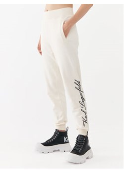 KARL LAGERFELD Spodnie dresowe 231W1050 Écru Regular Fit ze sklepu MODIVO w kategorii Spodnie damskie - zdjęcie 168622990