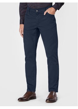 Gino Rossi Spodnie materiałowe Tesero GR22-SPMJ508 Granatowy Regular Fit ze sklepu MODIVO w kategorii Spodnie męskie - zdjęcie 168623120