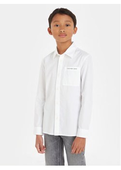 Calvin Klein Jeans Koszula Ceremony IB0IB01737 Biały Regular Fit ze sklepu MODIVO w kategorii Koszule chłopięce - zdjęcie 168631602