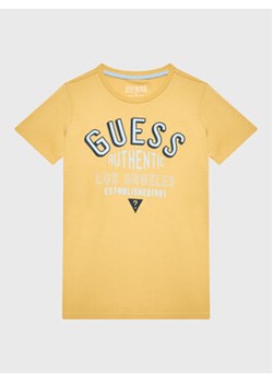 Guess T-Shirt N3RI09 K8HM0 Żółty Regular Fit ze sklepu MODIVO w kategorii T-shirty chłopięce - zdjęcie 168633414