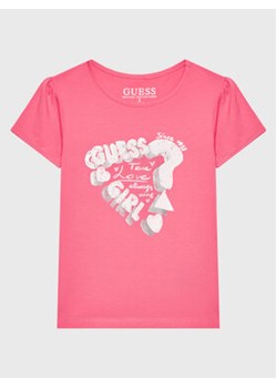 Guess T-Shirt K3RI13 K6YW1 Różowy Regular Fit ze sklepu MODIVO w kategorii Bluzki dziewczęce - zdjęcie 168637230