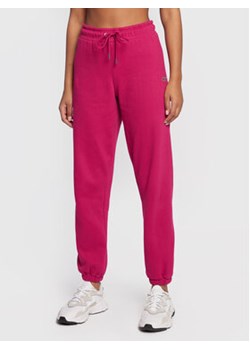 DKNY Sport Spodnie dresowe DP2P3114 Różowy Regular Fit ze sklepu MODIVO w kategorii Spodnie damskie - zdjęcie 168638411