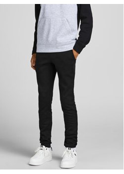 Jack&Jones Junior Spodnie dresowe Basic 12190406 Czarny Regular Fit ze sklepu MODIVO w kategorii Spodnie chłopięce - zdjęcie 168640380