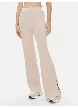 Calvin Klein Spodnie dzianinowe Essential K20K206023 Beżowy Wide Leg ze sklepu MODIVO w kategorii Spodnie damskie - zdjęcie 168646823