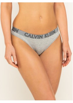 Calvin Klein Underwear Stringi Ultimate 000QD3636E Szary ze sklepu MODIVO w kategorii Majtki damskie - zdjęcie 168647002