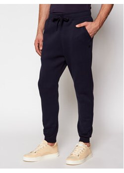 G-Star Raw Spodnie dresowe Premium Core D15653-C235-6067 Granatowy Slim Fit ze sklepu MODIVO w kategorii Spodnie męskie - zdjęcie 168652792