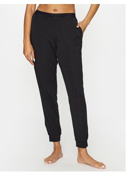 Calvin Klein Underwear Spodnie piżamowe 000QS7004E Czarny Regular Fit ze sklepu MODIVO w kategorii Piżamy damskie - zdjęcie 168653122