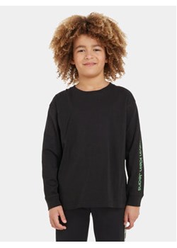 Calvin Klein Jeans Bluzka Glow In The Dark IB0IB01897 Czarny Regular Fit ze sklepu MODIVO w kategorii T-shirty chłopięce - zdjęcie 168656354