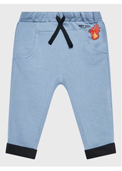 United Colors Of Benetton Spodnie dresowe 3J74GF00X Niebieski Regular Fit ze sklepu MODIVO w kategorii Spodnie chłopięce - zdjęcie 168657770
