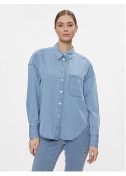 Tommy Jeans Koszula jeansowa DW0DW17355 Niebieski Oversize ze sklepu MODIVO w kategorii Kurtki damskie - zdjęcie 168669141